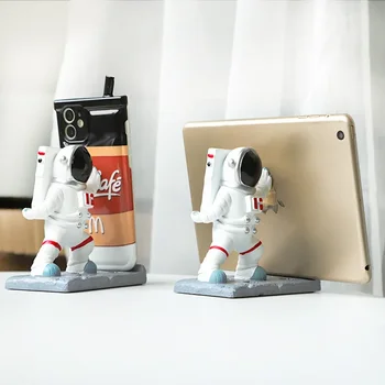 Derva astronautas stumia mobiliojo telefono laikiklį, astronautų mobiliojo telefono laikiklį, stalinio animacinio filmo personažo dekoraciją Nešiojamas