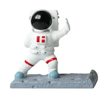 Derva astronautas stumia mobiliojo telefono laikiklį, astronautų mobiliojo telefono laikiklį, stalinio animacinio filmo personažo dekoraciją Nešiojamas